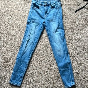 American Eagle Jeans. No holes just plain blue.